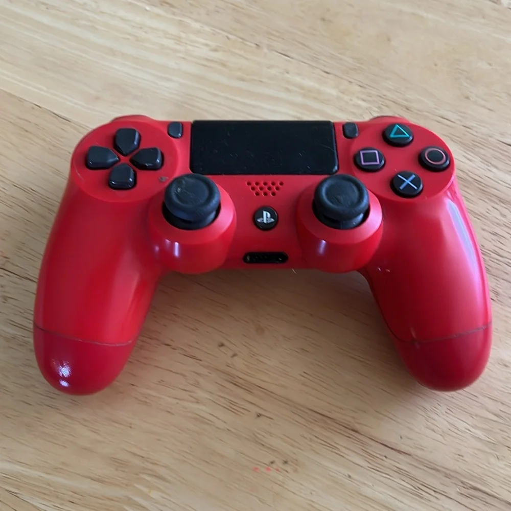 DualShock 4 Wireless Controller for PlayStation 4 - Magma Red used Red